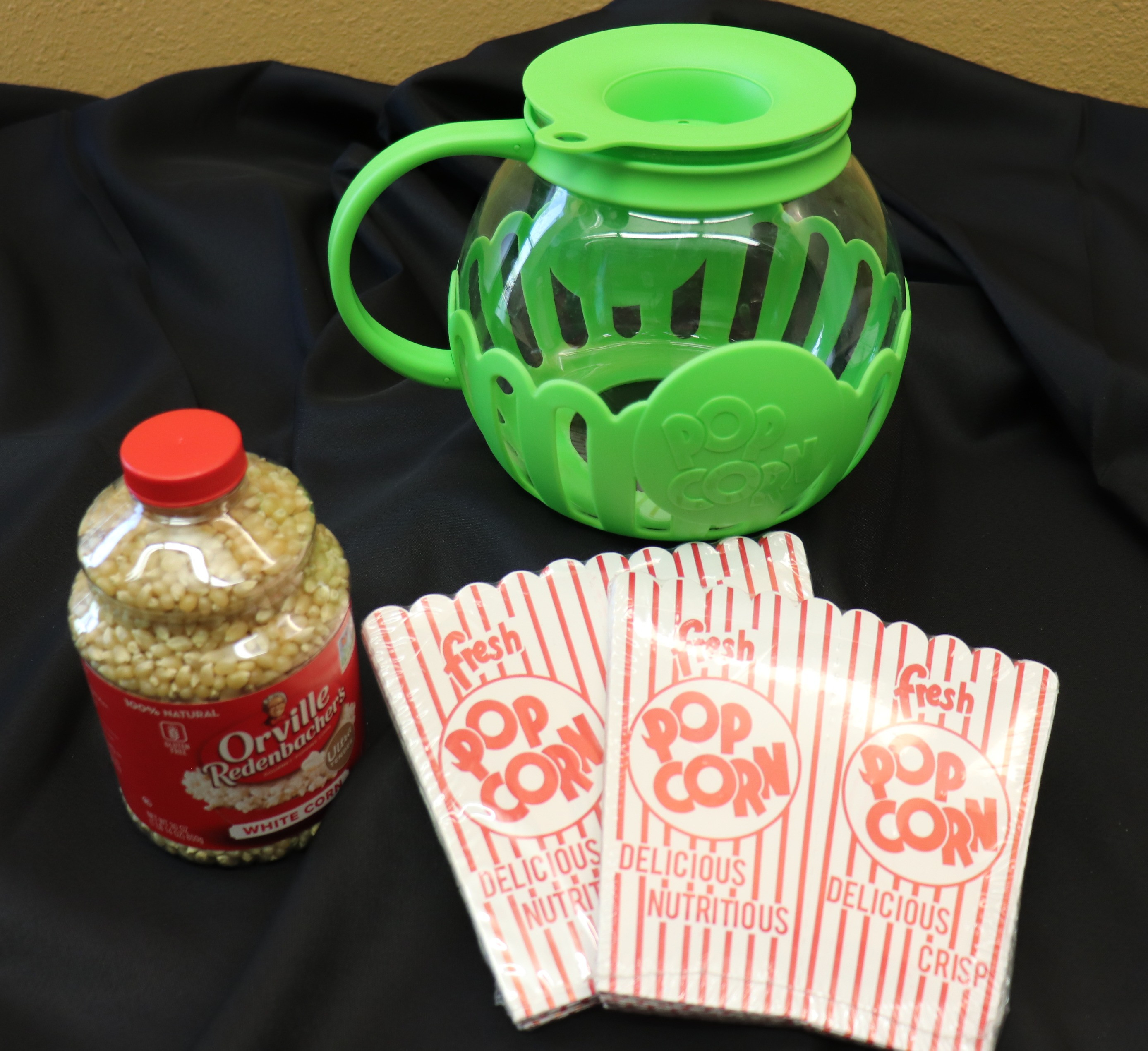 Microwave popcorn popper, bags, and kernels.