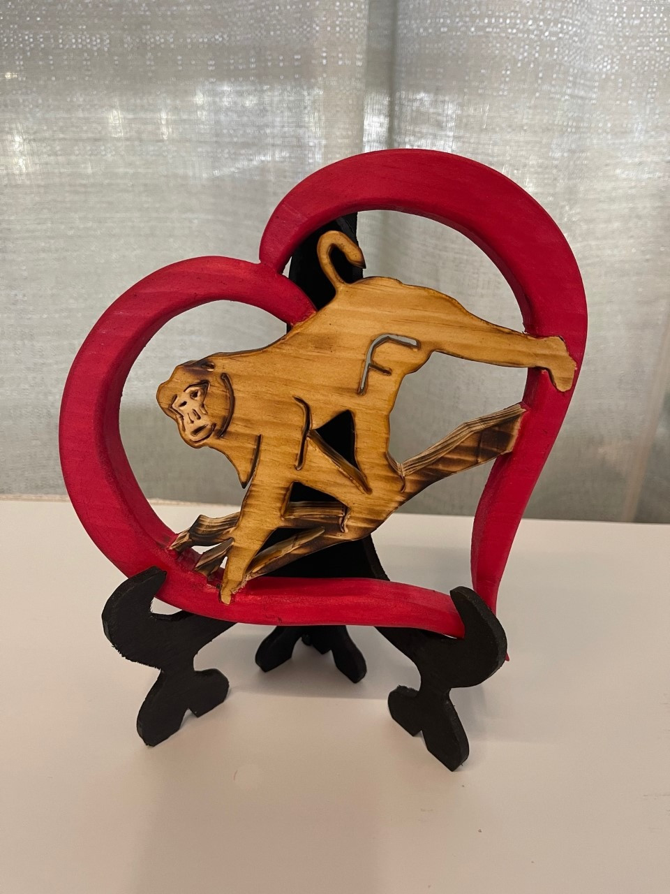 Hand Carved & Painted Wood Heart with Monkey (and display stand).  Artist: Dawn Conover "Old Rustic Crow".  (7" x 7" on display stand)