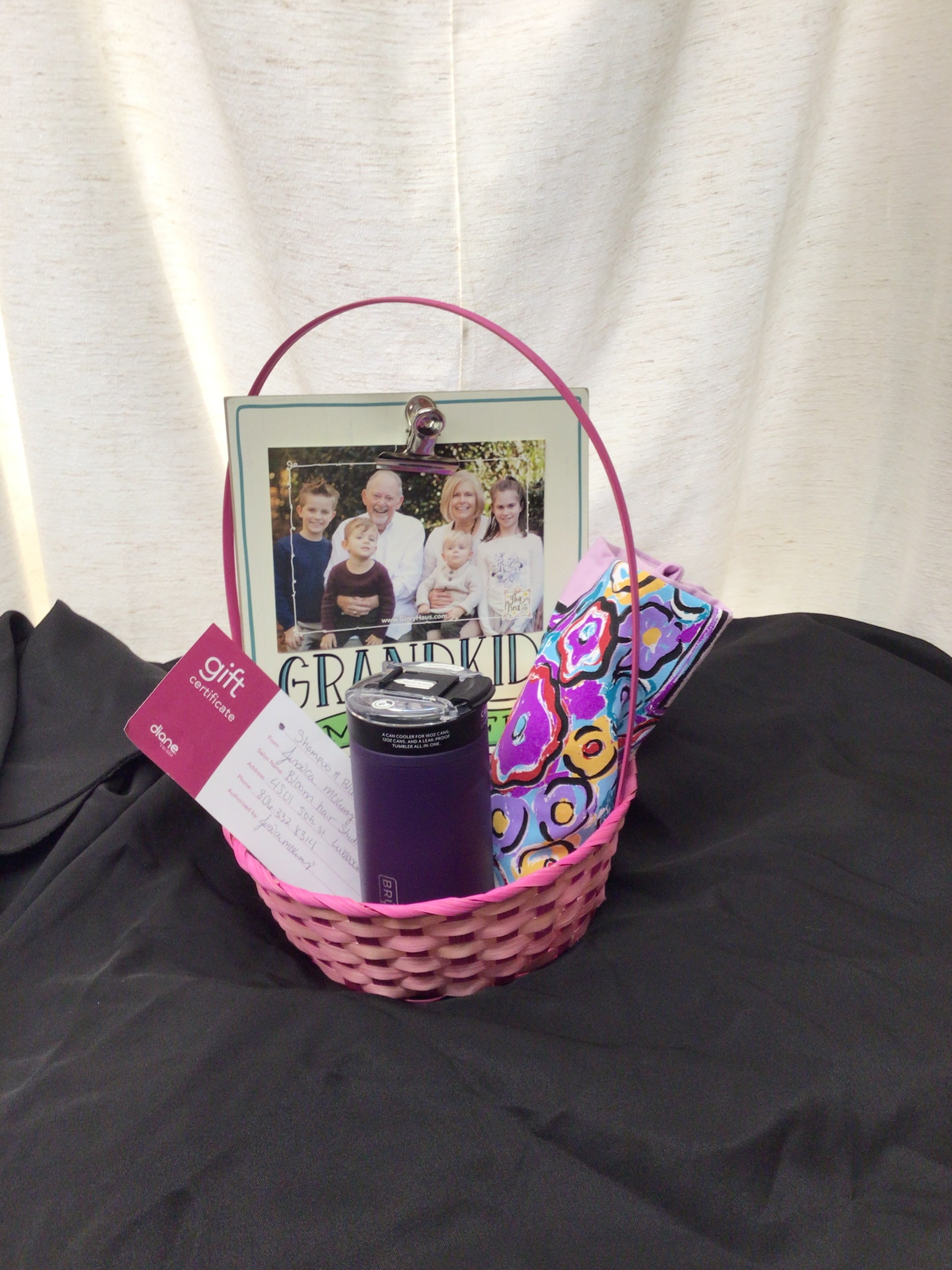 I love my Grandkids Picture Frame, a blow out and shampoo certificate at Bloom Hair Studio, purple BruMate cup, & T-shirt (large).