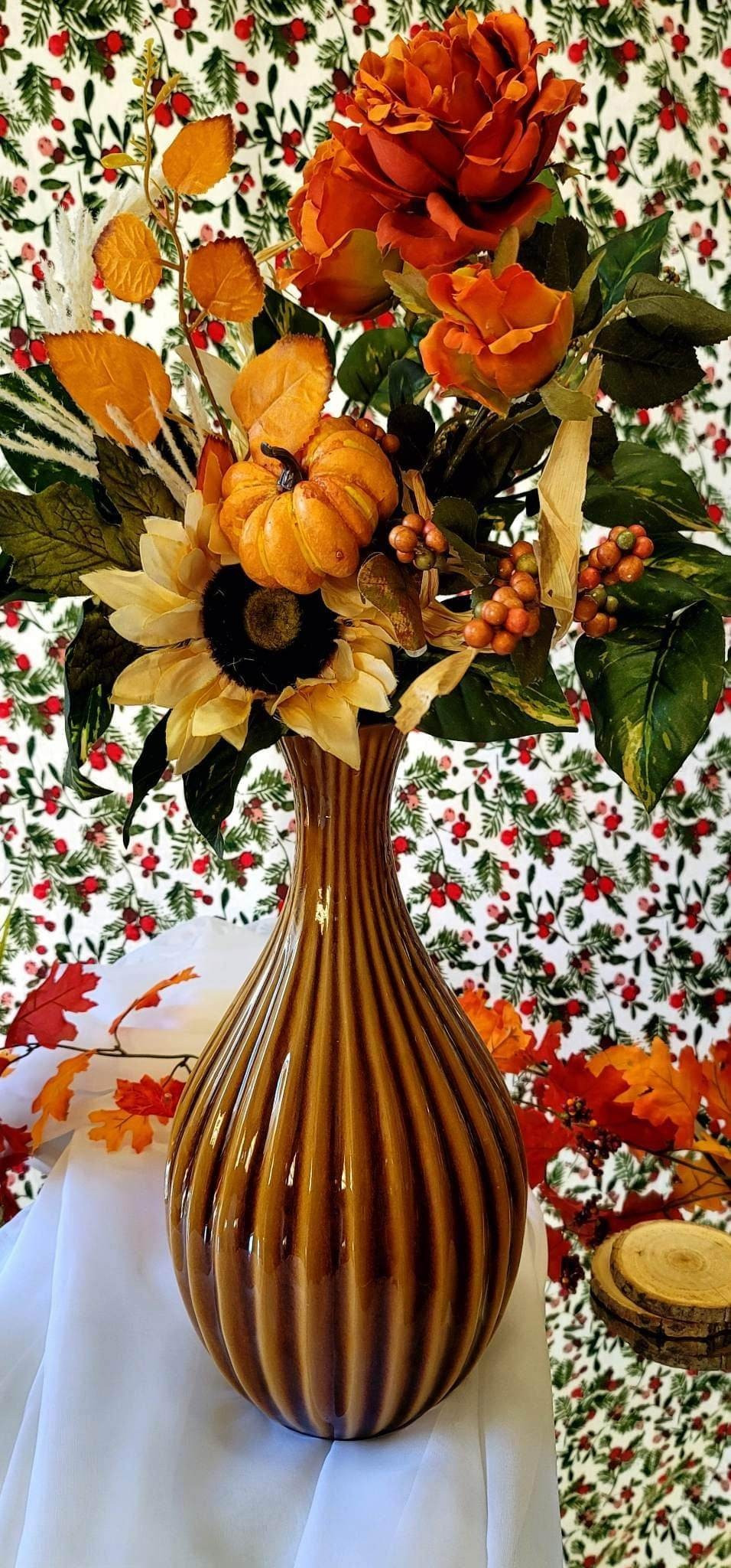 Blond Ribbed Fluted Vase, approx 15in tall x 7in wide. Glossy ceramic. Image shows an autumn floral arrangement to complement the vase colors. *Florals not included. | View more images of this item at: https://drive.google.com/drive/folders/1-kZzDArRk0ipkooUZeVZjWjQwR70M5s5?usp=share_link