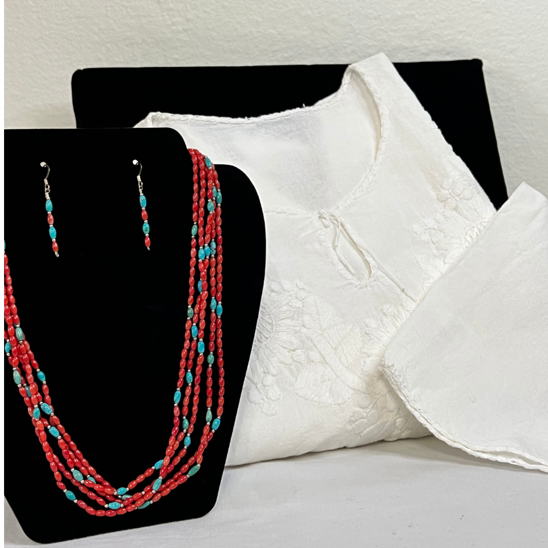 White embroidered shirt & red and turquoise beaded jewelry