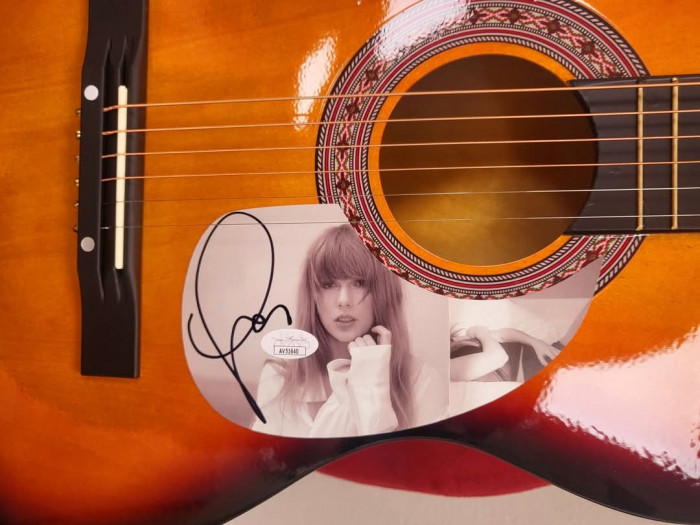 CALLING ALL SWIFTIES!!!!!!!!!!!! This is your opportunity to own an AUTHENTICALLY signed Taylor Swift autographed guitar. This guitar comes with a certificate of authenticity.