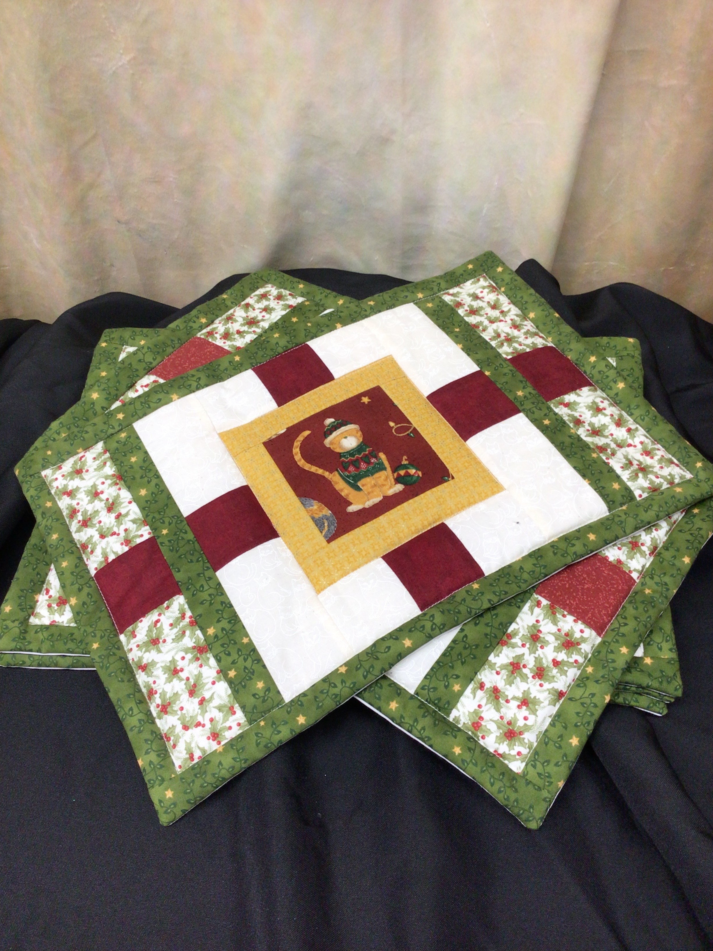 Set of four handmade Christmas place mats.