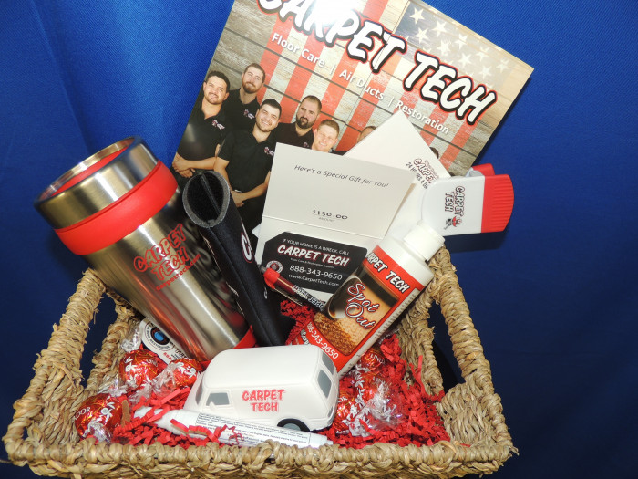 A Carpet Tech basket filled with Lindor Chocolates, a few Carpet Tech swag items, along with a Spot Out Cleaning solution and $150 giftcard