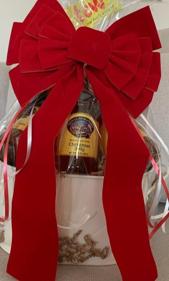 Basket including salsas, seasoning packets, Christmas jelly and crackers