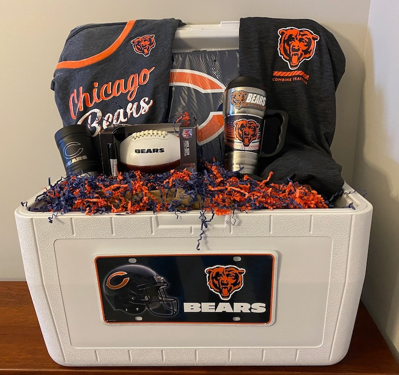 Bears cooler with stadium seat, his and her Bears shirts and other Bear's paraphernalia.
