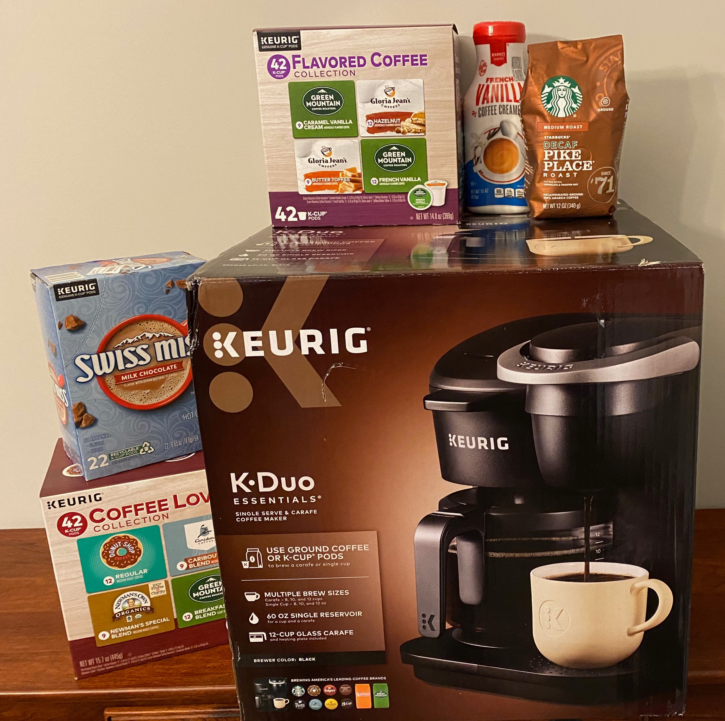 Wake up to a new Kuerig Duo Coffee Maker plus assorted k-cup coffees and hot chocolates.