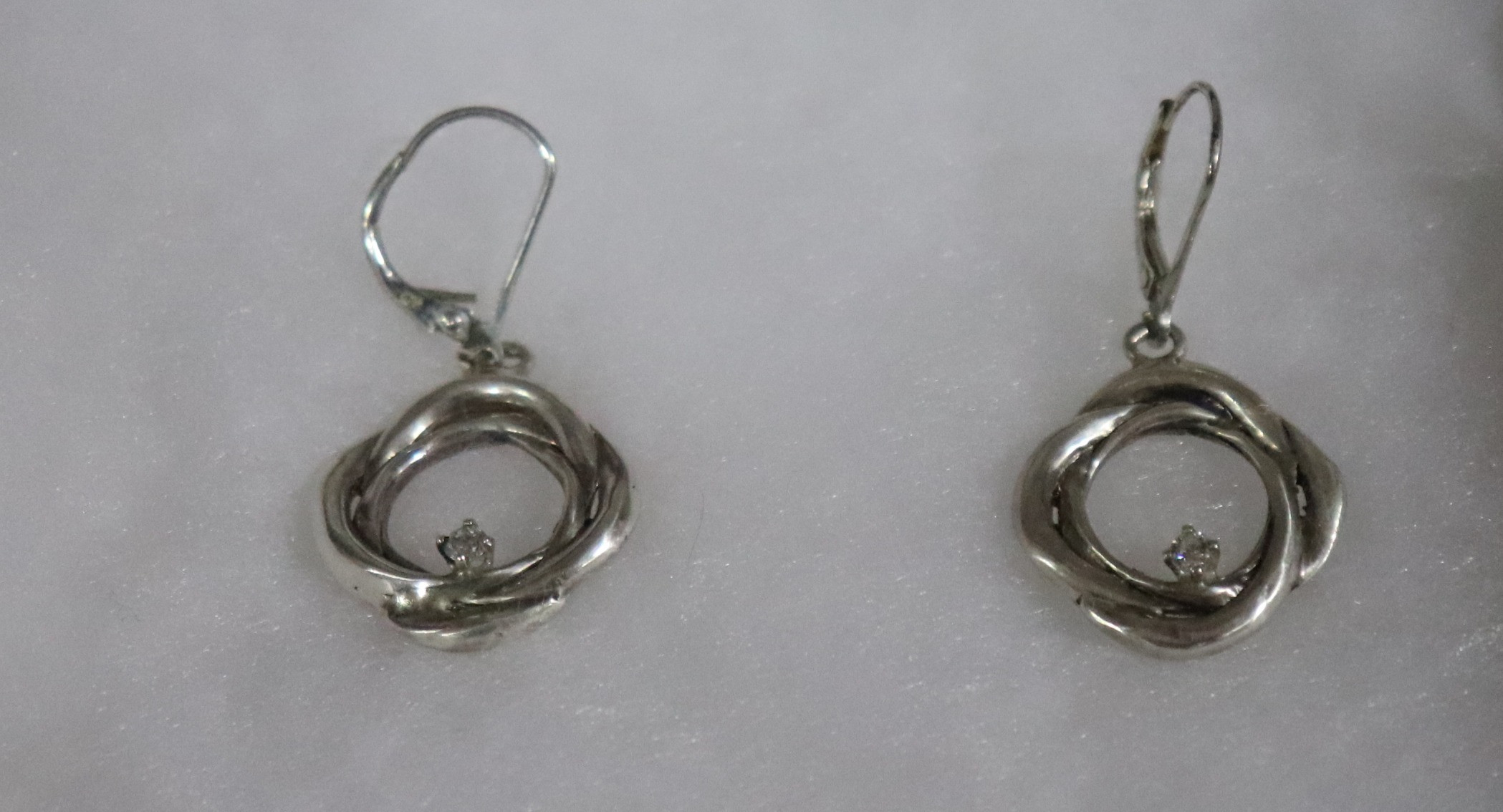 Sterling silver CASFV knot earrings, special design by Johnson Jewelers