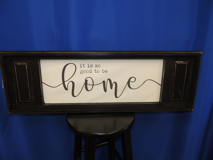 "It is so good to be Home" framed in a beautiful, well made, black wood frame.