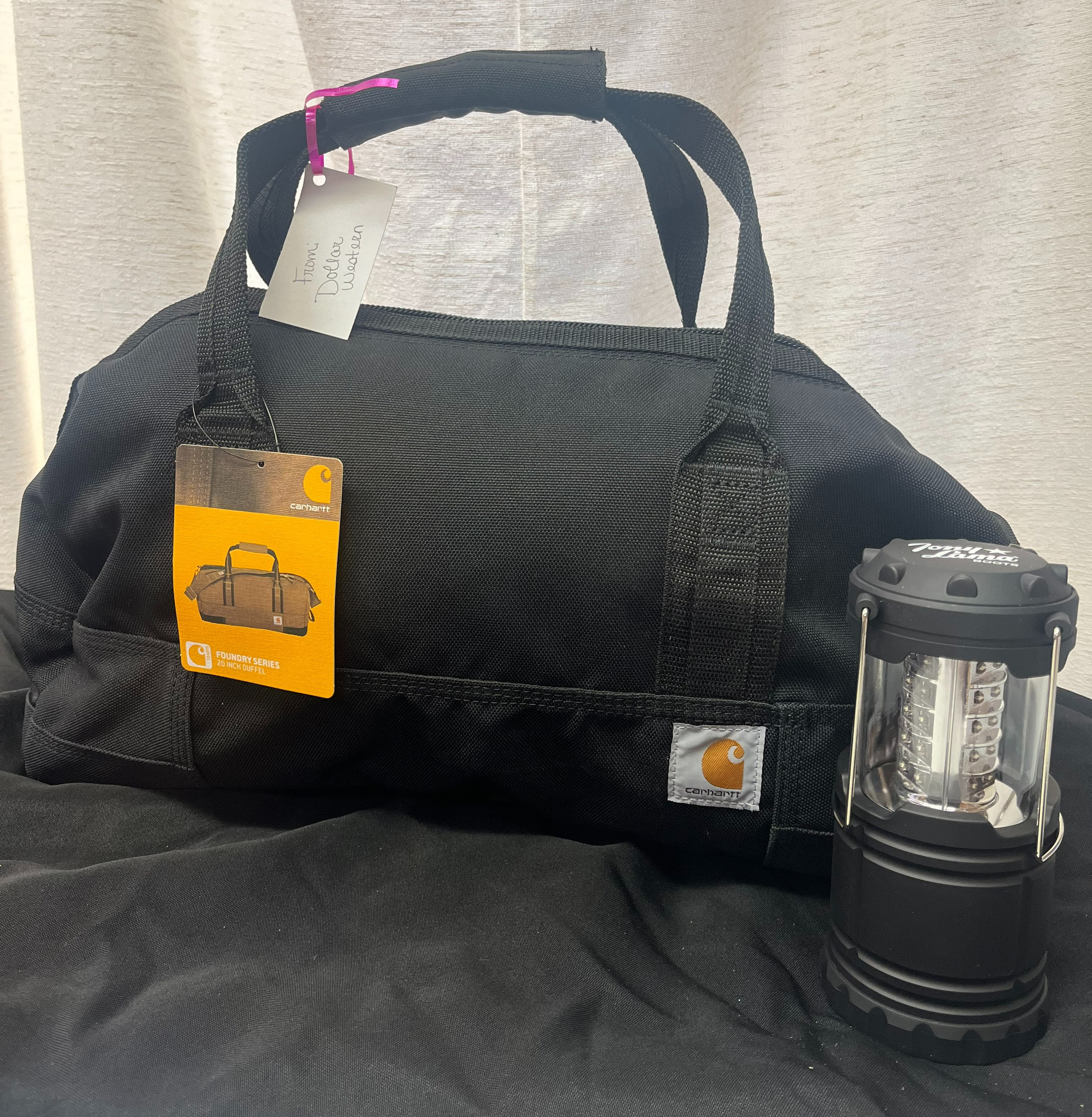 Black 20 in duffel bag with Tony Lama Botts light.