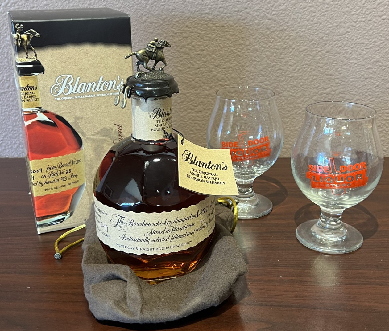 Bottle of Blantons Bourbon w/ two (2) glasses