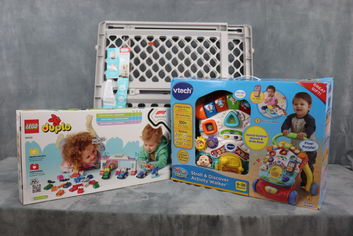 This LEGO DUPLO F1 Team Race Cars & Drivers race track set lets toddlers build buildable cars and race lights.
This VTech Stroll learning walker adapts from seated floor play to a walking support tool with lights and sounds.
The Regalo Expandable Plastic Safety Gate is a lightweight plastic gate that uses a twist-and-lock system to safely block off rooms.