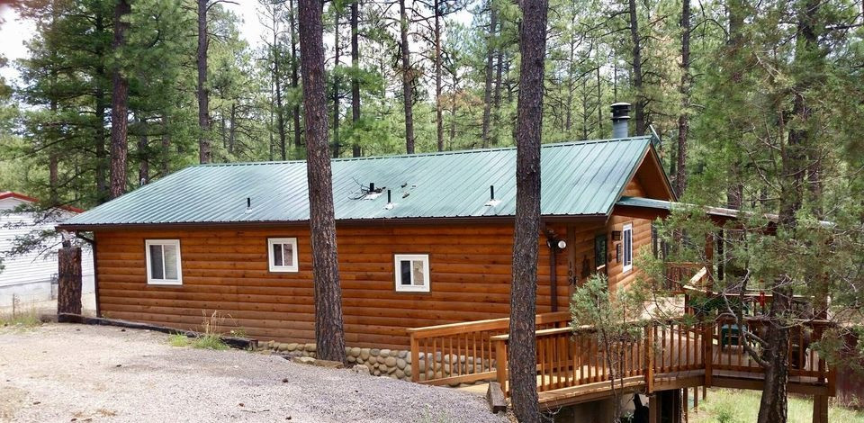 4 days/3 nights stay at "A-Team Hideaway Cabin in Ruidoso, NM - Cozy cabin nestled in the mountains. Great cabin feel with all the conveniences of modern living. Full cooking kitchen and outdoor grill for those wanting to stay in for meals. Wood burning fireplace in the living room for warm romantic evenings or family time around the fire. Wrap around deck wonderful for bird watching, relaxing, or spending an evening under the stars in the crisp mountain air. Easy access to local casinos(3), several golf courses, skiing, zip lines, hiking, horse racing, shopping, horseback riding and over 25 restaurants to try in the village.  980 sq. ft., sleeps 6, 2 bedrooms, 1 bathroom and queen sleeper sofa, 2 twin beds and queen bed in master. Pets welcome, parking available, TV, Internet, Washer & Dryer available. Retail Value for 3 nights: $855. Trip dates can be booked any time in 2021 with available date’s setup with the cabin owner