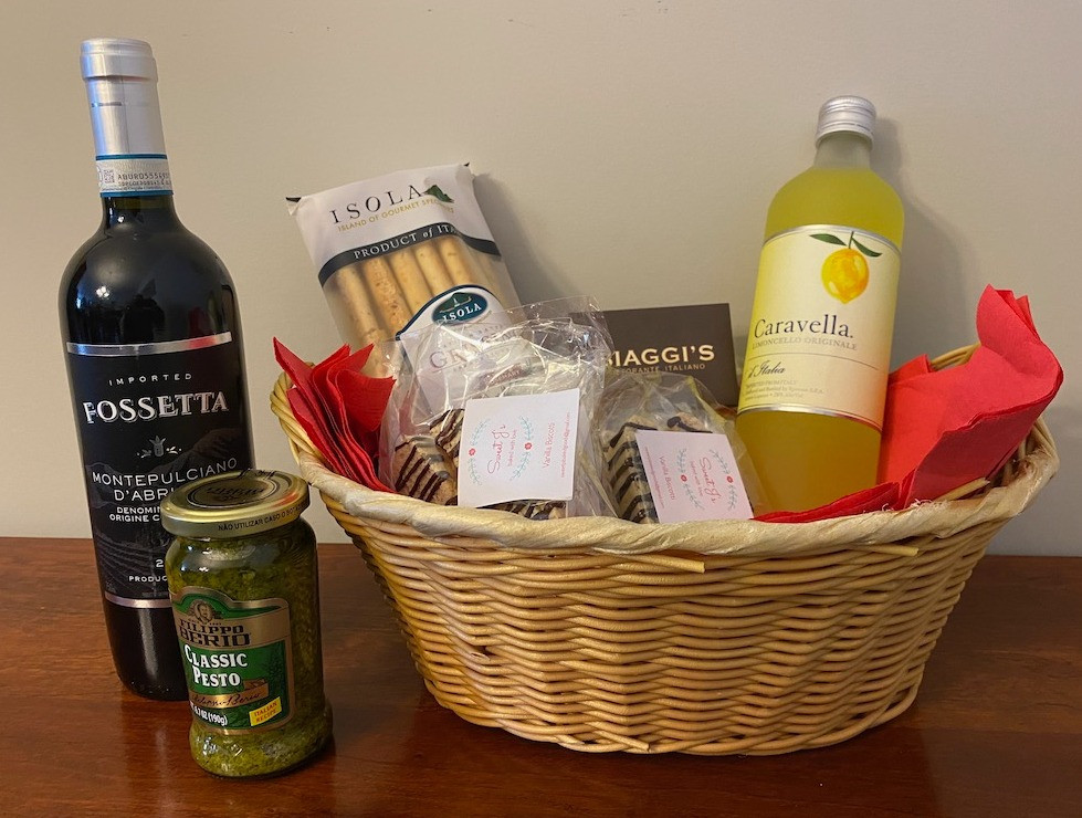 Beautiful basket with a $75 gift card from Biaggi's Restaurant, Limoncello, red wine, and pesto and breadsticks.