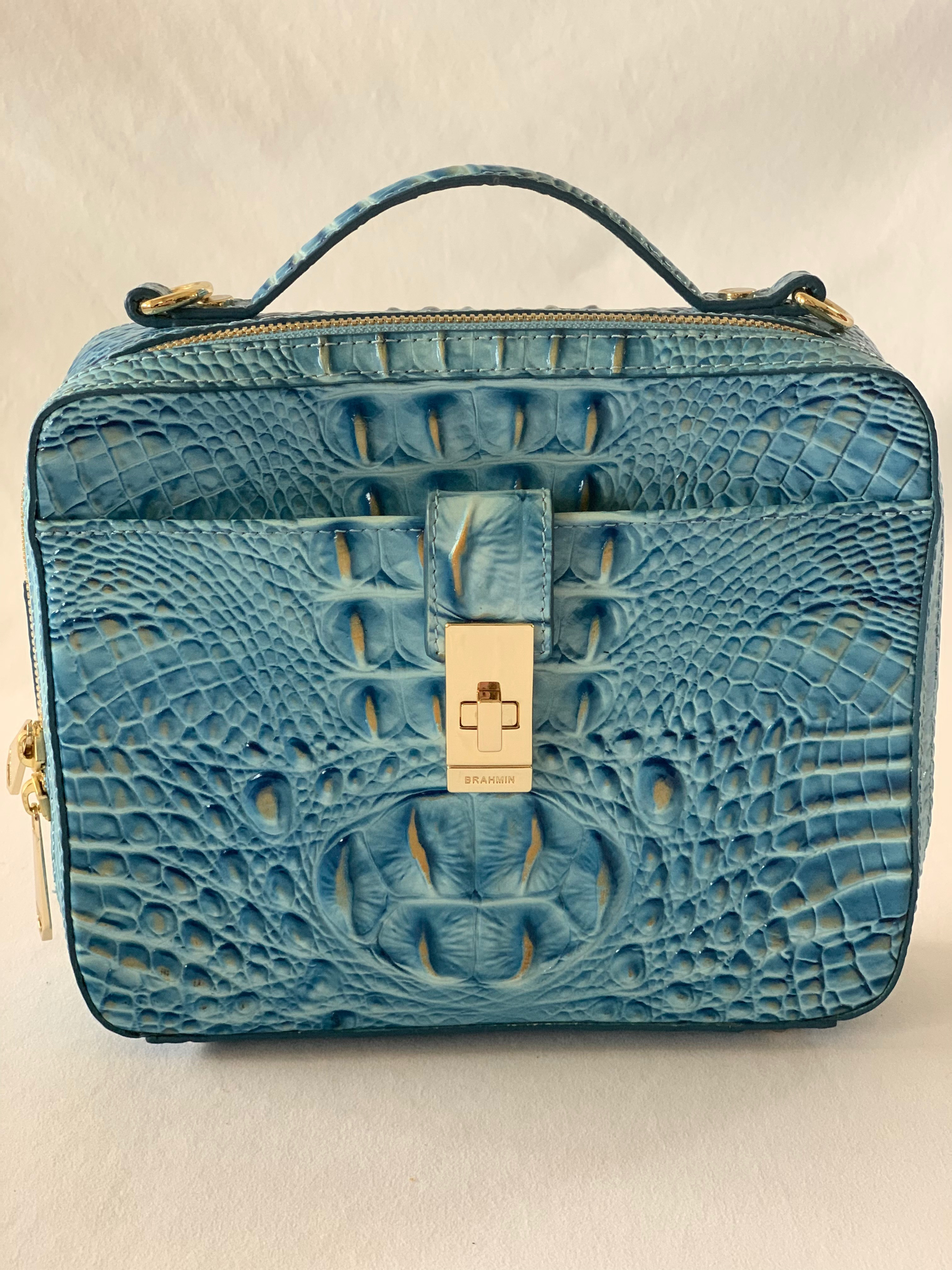 Artic blue, iridescent crocodile embossed crossbody bag. Can be used as a handbag/clutch as pictured. Like new.