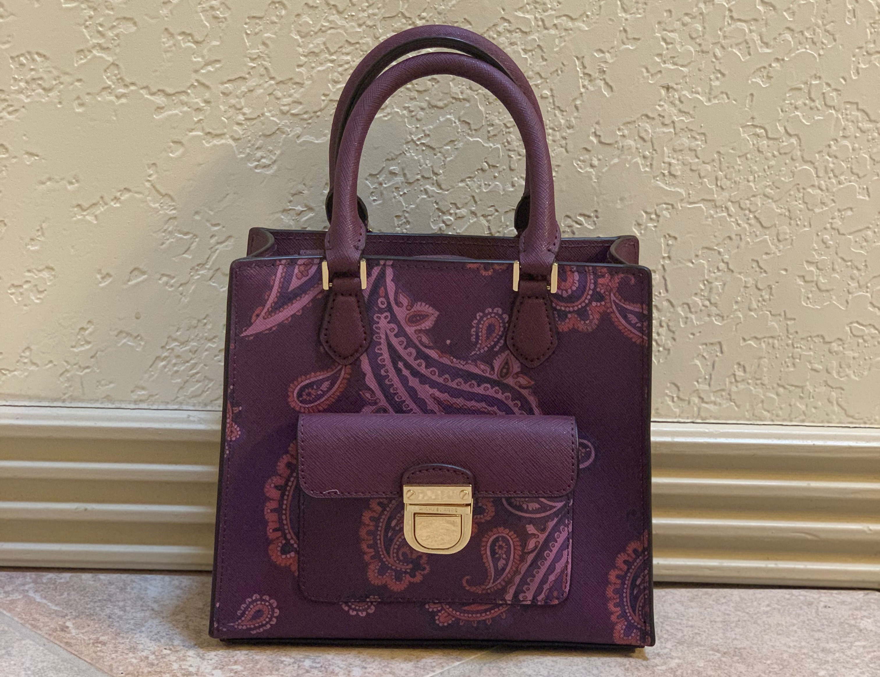 Plum paisley mini crossbody bag. Can be used as handbag or crossbody. Like new.