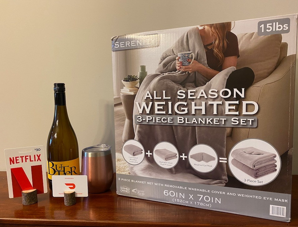 Curl up with your 15 lb. weighted blanket and enjoy a Netflix $30 gift card, a Doordash $25 gift card, a bottle of wine and a wine tumbler.