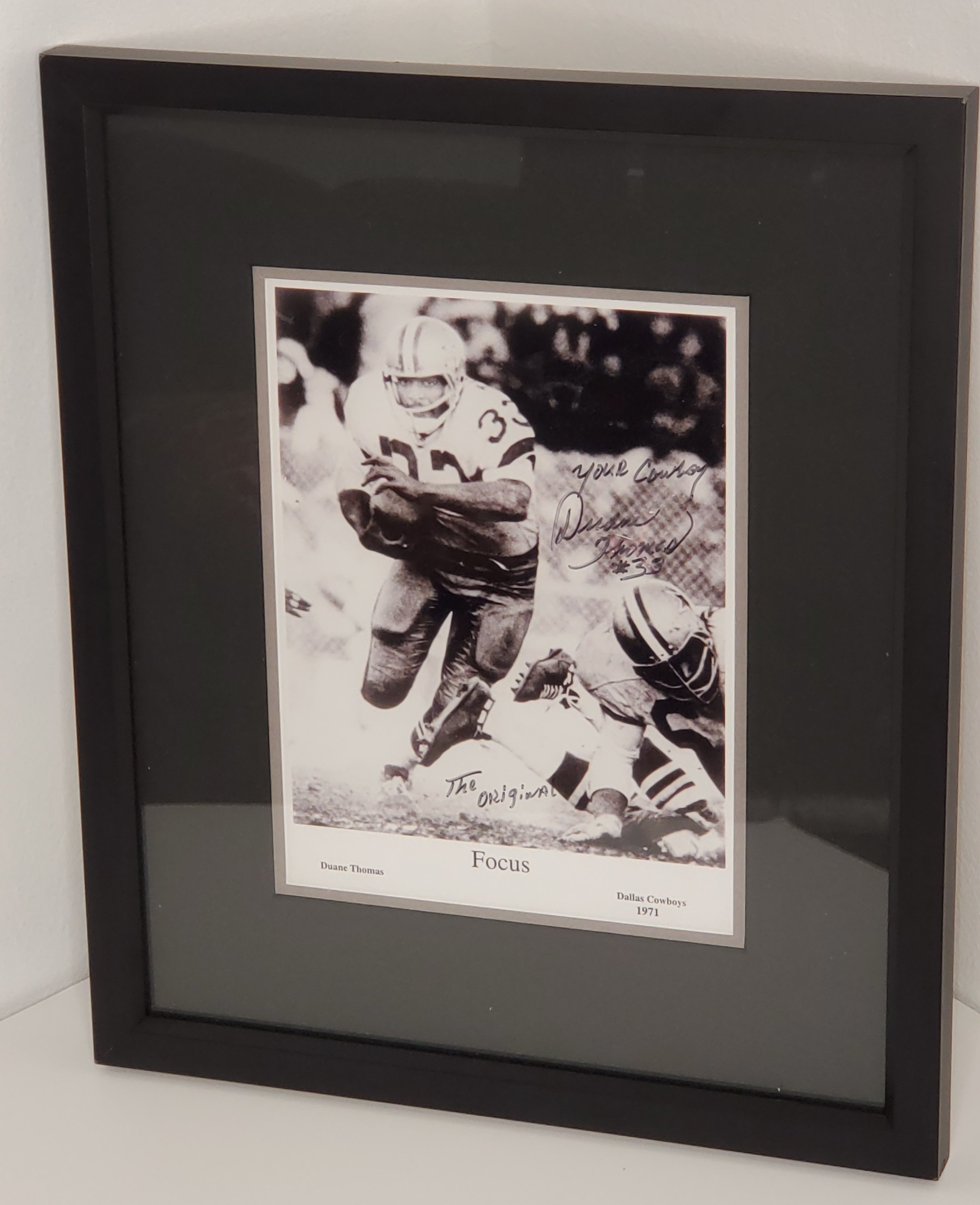 Autographed, framed and matted 8 X10 photo of Super Bowl Champ (Dallas Cowboys) Duane Thomas.