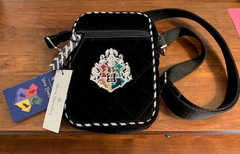 Limited Edition Vera Bradley Harry Potter Crossbody Bag. Provides RFID protecxtion for credit and debit cards. Carry as a crossbody or a belt bag. Enterior features a zip pocket. Interior features four card slips and a zip pocket. Removable belt strap. Zip closure. Dimensions: 4.5" w x 6.5" h x 1..25" d with 56.0" removable, adjustable strap and 47.0" removable, adjustable strap.