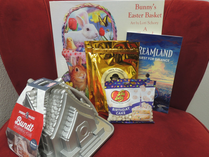 From Otto's Granary in Lubbock, this beautiful set features some amazing items that make this basket even more special. This basket has a Red Velvet Coffee, Decaf Black Raspberry Coffee, a beautiful easter basket puzzle, a beautiful Gingerbread House Bundt Cake mold and an amazing book "Dreamland; A Quest for balance". This book is written by a long time Tahoka native family member and is also autographed by Kenneth Carter, himself.