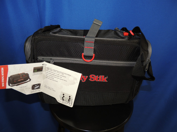 Ugly Stik tackle box, black, grey and red in color. Holds FOUR boxes, medium in size.