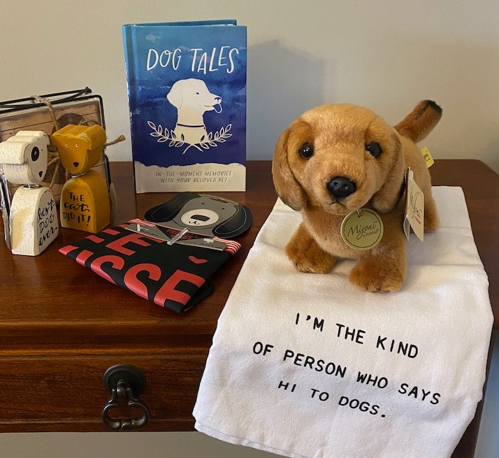 All "dog-related" items for you and your favorite pet...dog journal and bandana, coasters and a tea towel.