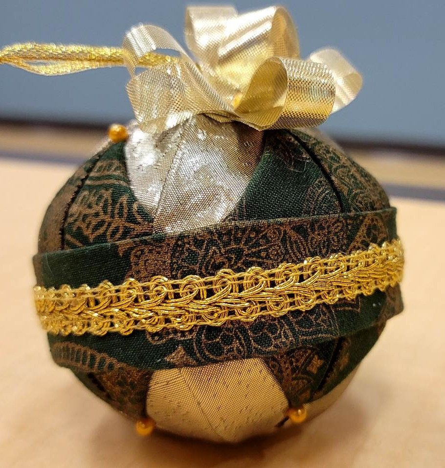 Handmade No-Sew Fabric Ornament in Sphere Shape with colors Champagne, Gold & Forest Green. By Wendy Green, Green's Creativity Craft Shop (The Deaf Art Collective). | View more images of this item at: https://drive.google.com/drive/folders/11lPjamAP7rTtUBx80uuygX4ChOkrc9sm?usp=share_link