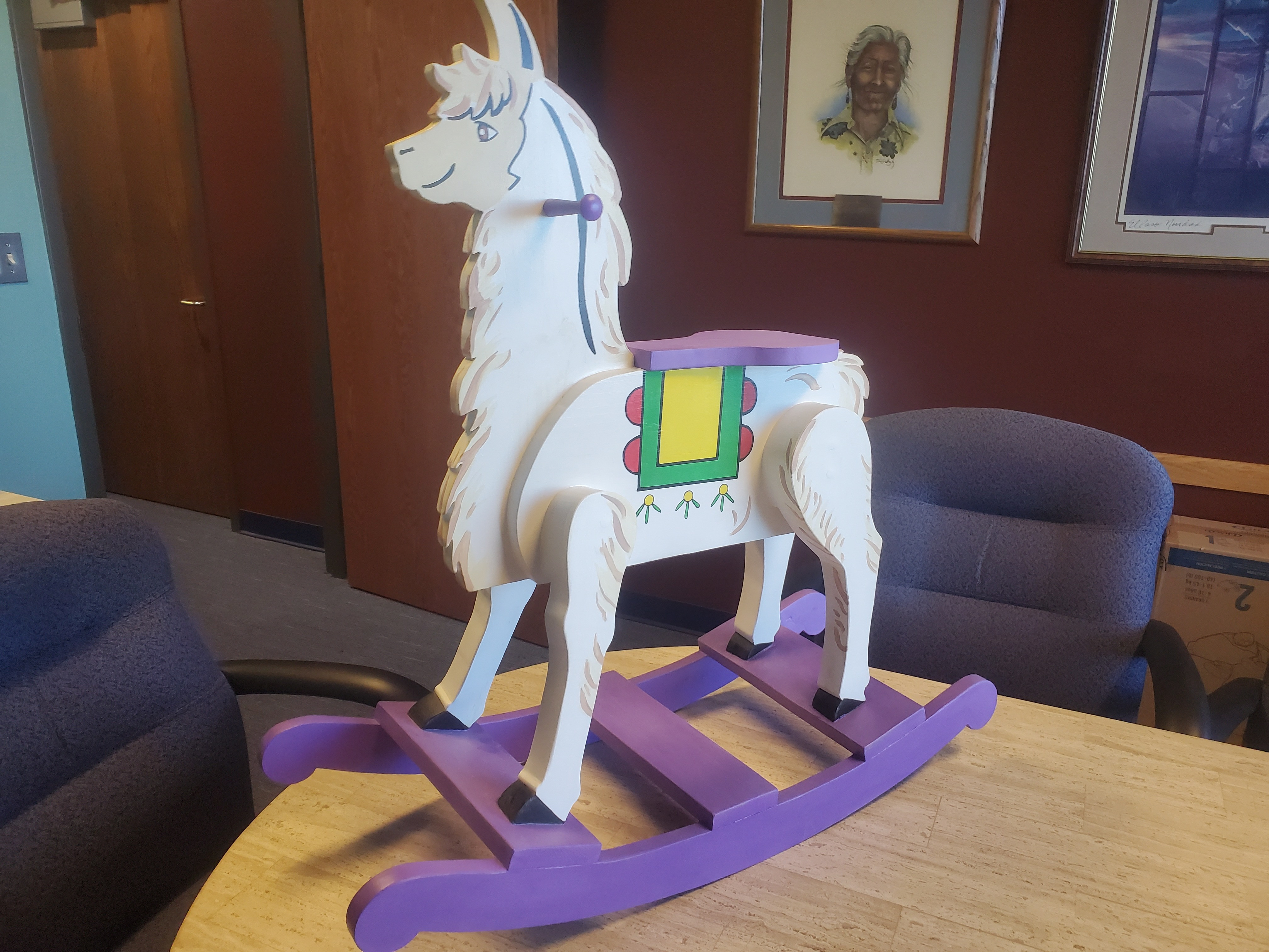 A beautiful hand crafted llama rocking chair for that special kid in your life.