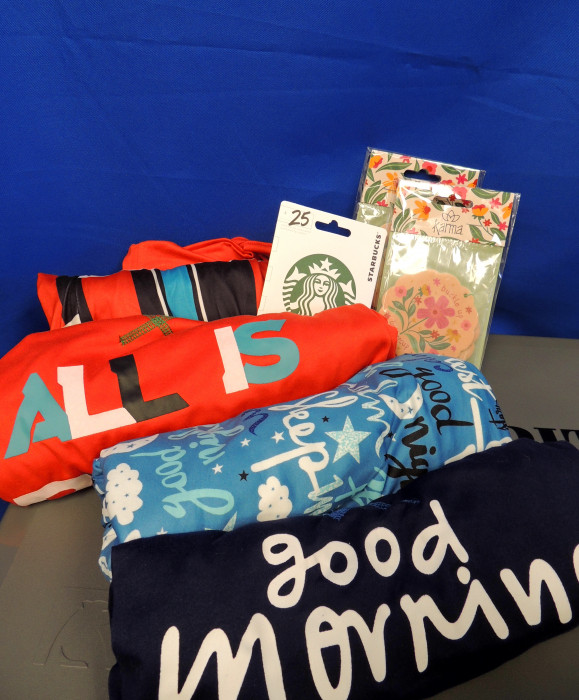2 pairs of Lg cozy Pajamas, a $25 gift card to Starbucks and some air fresheners.