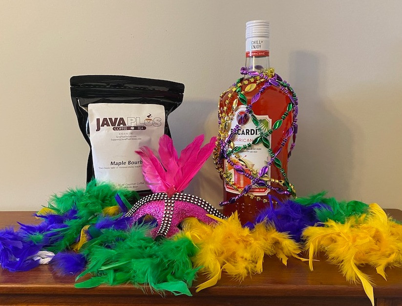 Celebrate Mardi Gras with a freshly baked King Cake (not pictured), Moe Joe's $50 gift card, Hurricane Mix with alcohol included and coffee beans.