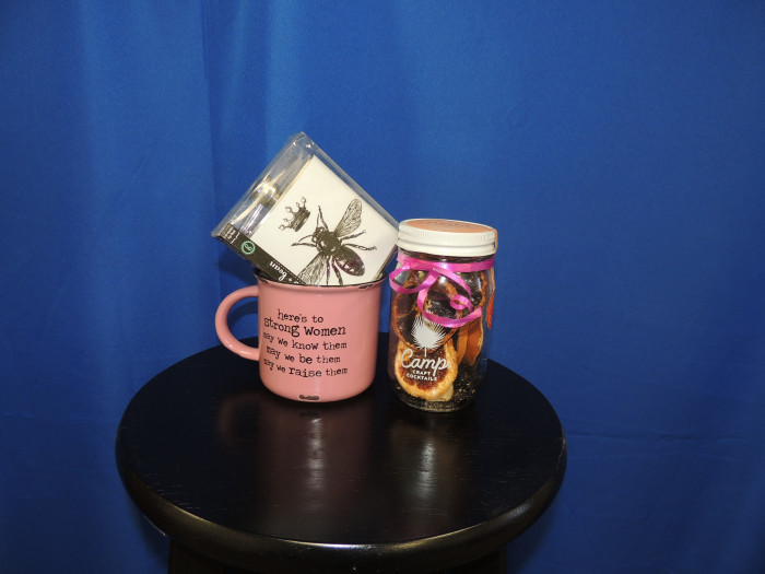 1 Queen Bee flask, a cute mug with a popular quote and a jar of premade Sangria ingredients.