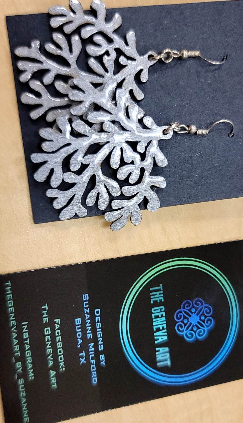 Silver/snow colored laser-cut bush-shaped earrings by artist Suzanne Milford of The Geneva Art (The Deaf Art Collective) Instagram: @thegenevaart_by_suzanne | View more images of this item at: https://drive.google.com/drive/folders/10ZTJIRhvxaOHC8kBY76mSk7urQFeAVi6?usp=share_link