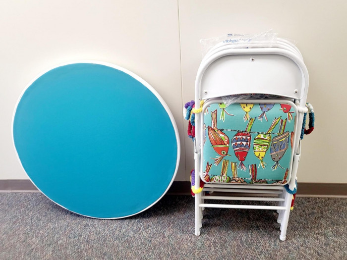 This adorable table comes with 4 foldable chairs. Table legs unfold from the base. Make it yours today.