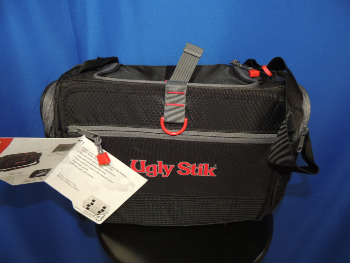 Ugly Stik tackle box, in black, grey and red. Holds FOUR boxes, and is medium in size.