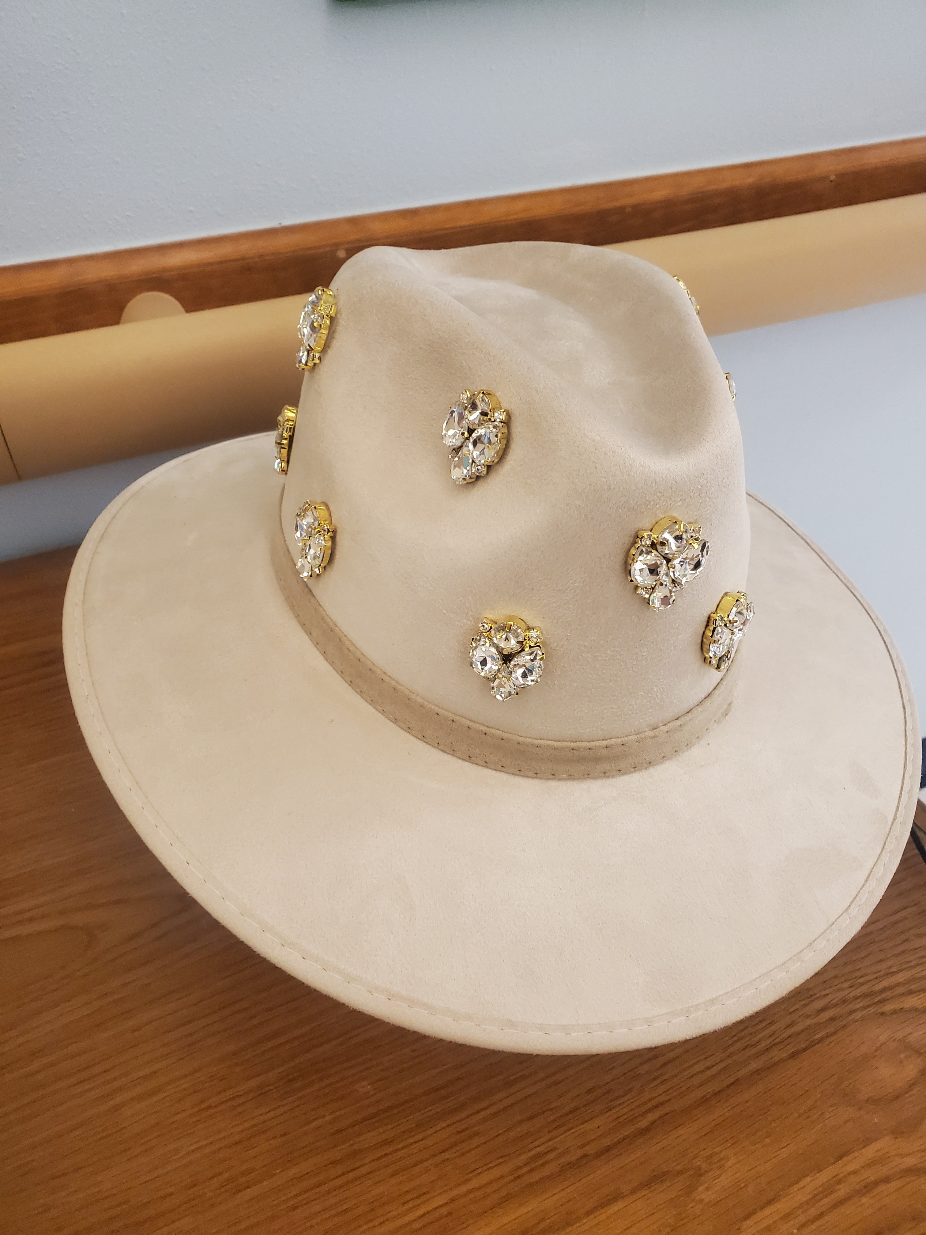 Beautiful gem studded women's hat. Travel the ciy or country in style with this cream colored gem.