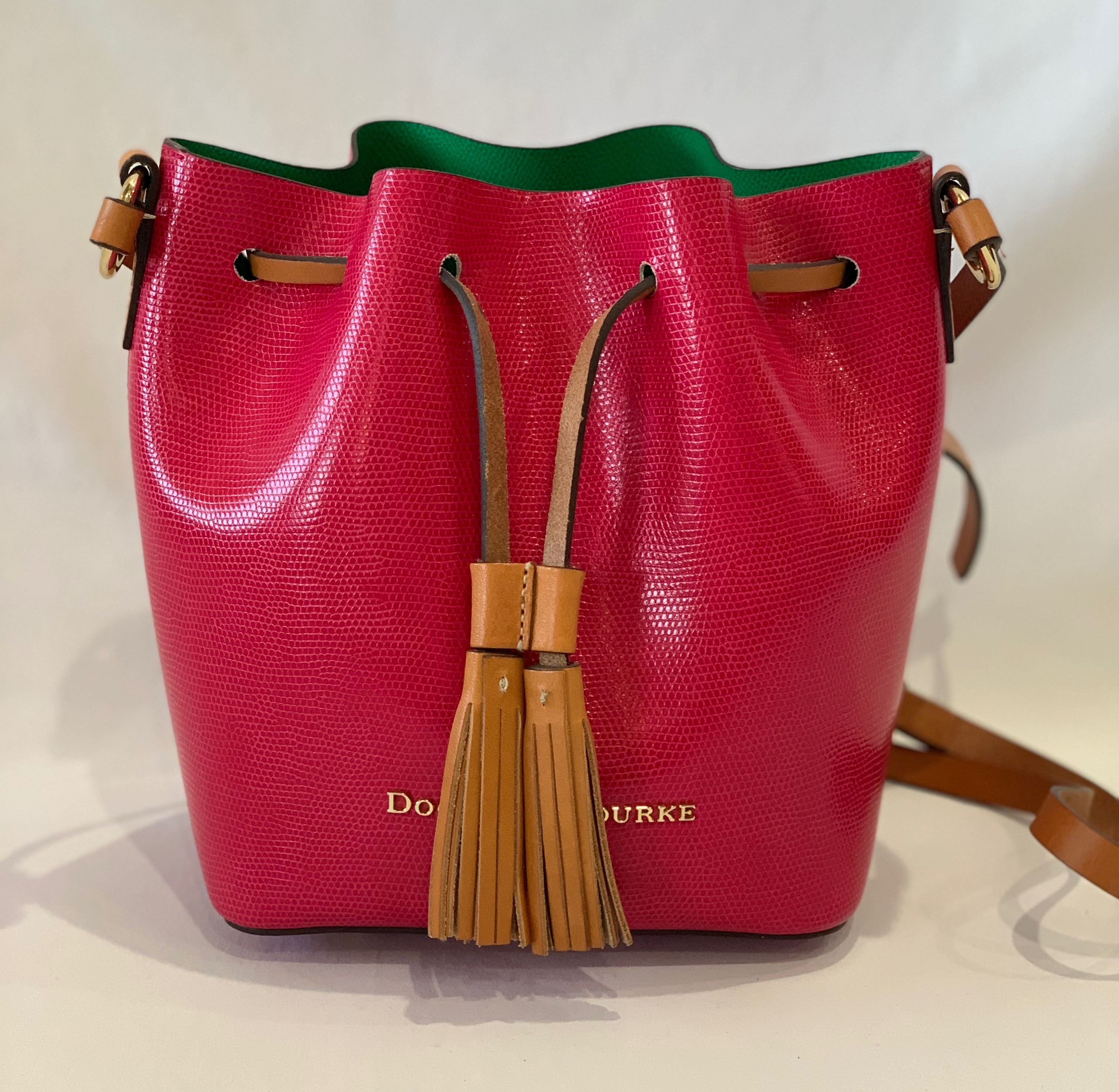 Fuchsia Kendel crossbody bag with kelly green interior and tan accents. Like new.