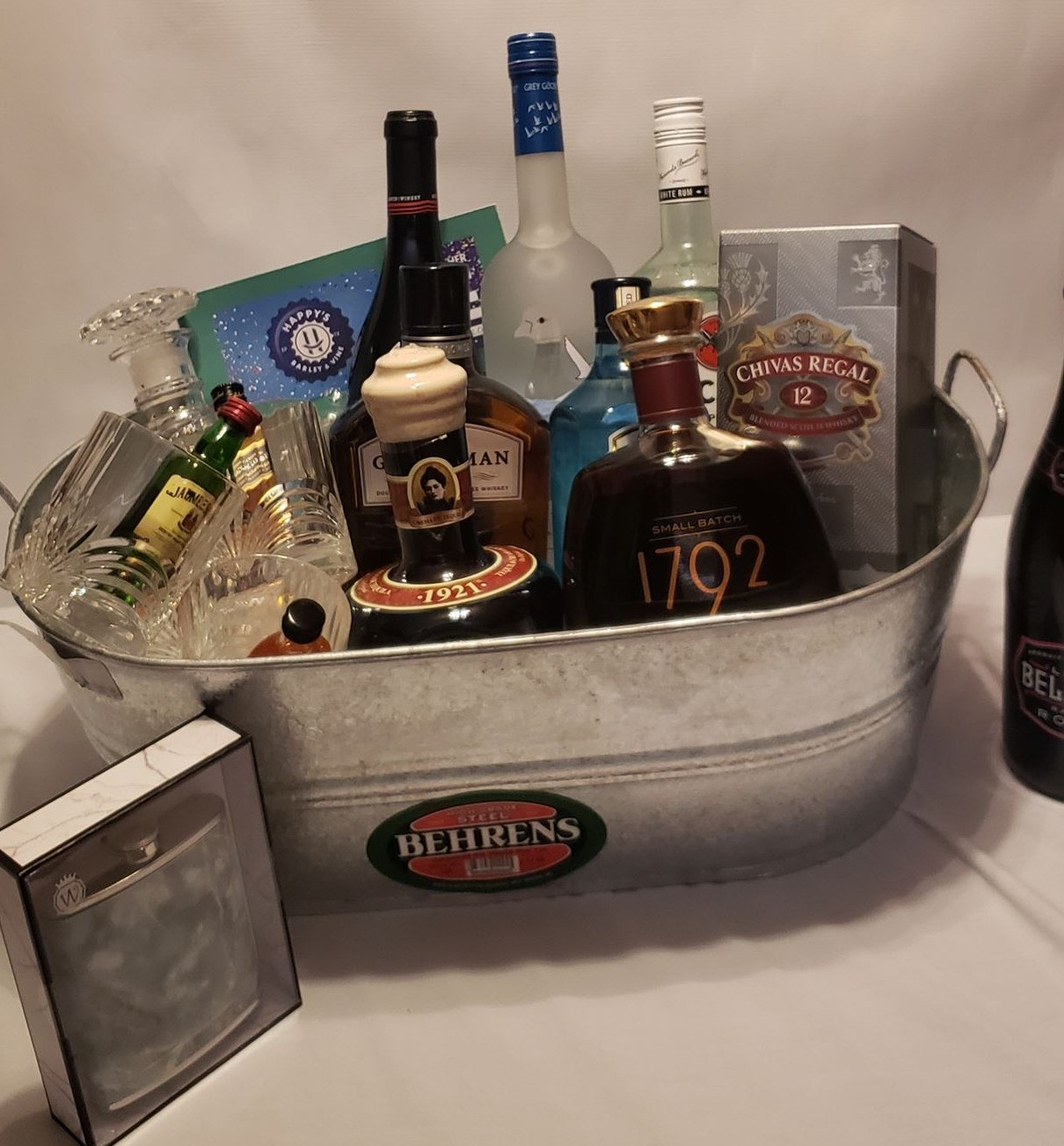 Variety of Bottles, 4 Baccarat Crystal glasses, Decanter, Flask & $25 gift card to Happy's Bar