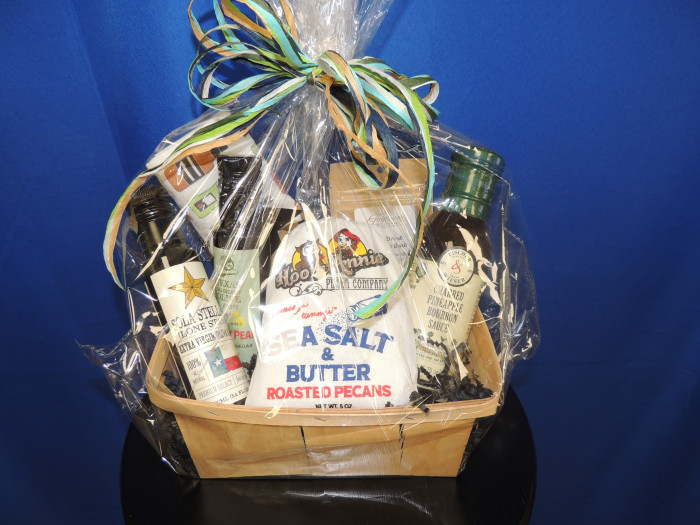 This set includes 1 Sola Stella Extra Virgin Olive Oil, 1 Prickly Pear Olive Oil, 1 Charred Pineapple Bourbon Sauce, a small bag of Sea Salt and Butter Pecans, a pack of Dried Pesto Basil and a cute dish cloth.