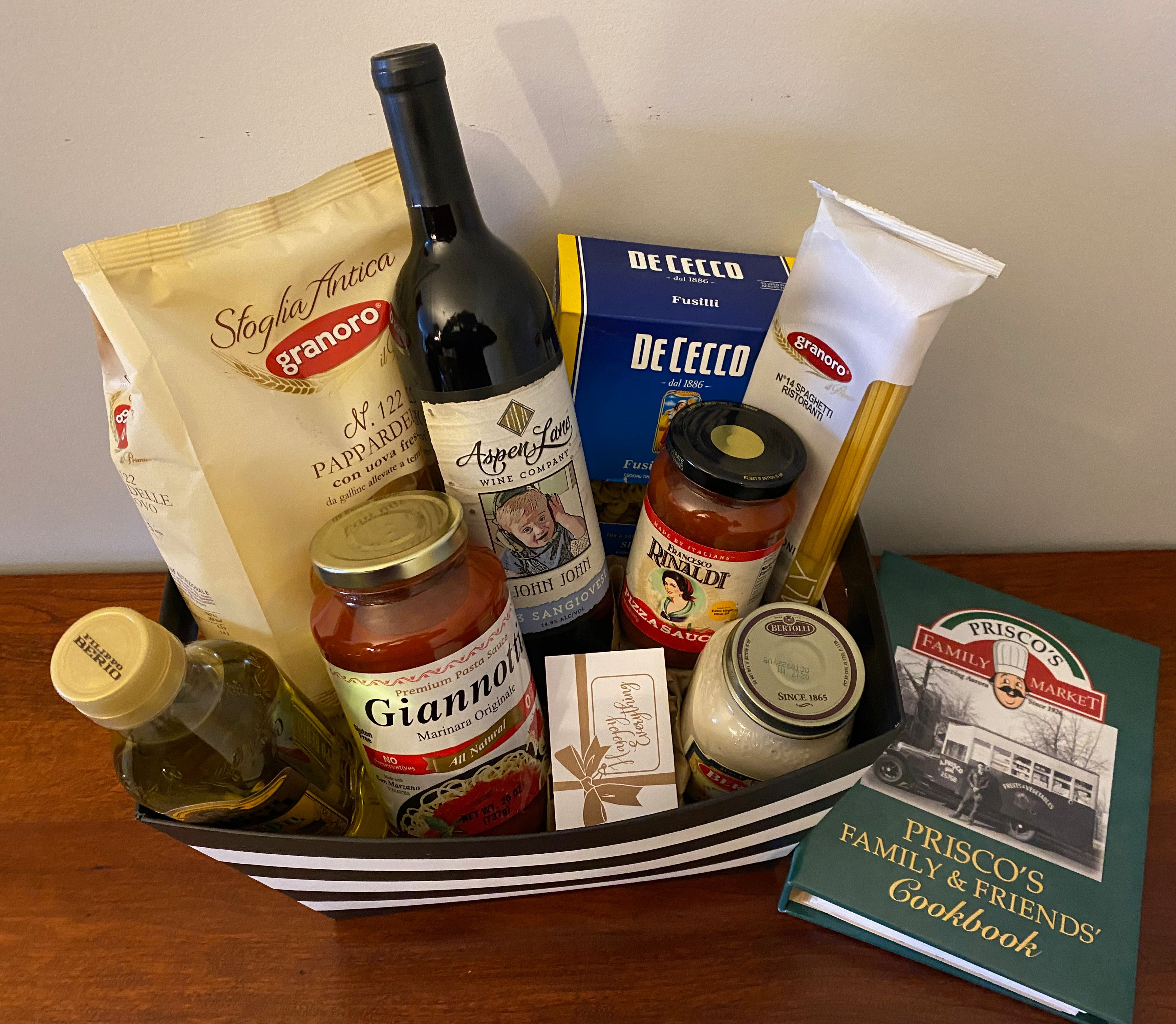Everything you need to make a pasta dish, plus a $100 gift card in this amazing Prisco's Gift Basket - pastas and sauces, a cookbook and wine.