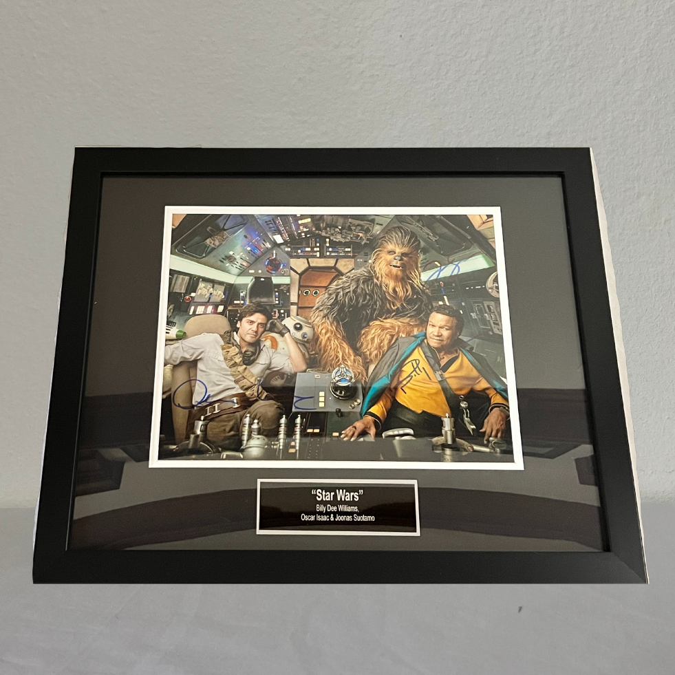 photograph signed by Billy Dee Williams (Lando), Oscar Issaac (Poe), Joonas Suotamo (Chewbacca)