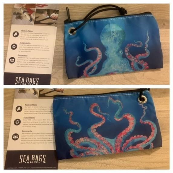 Sea Bags Octopus Wristlet - Handcrated from recycled sail cloth on the working waterfront in Portland, Maine, USA. Navy Zipper, Navy cording through grommet. Dimensions are 8" L x 5" H