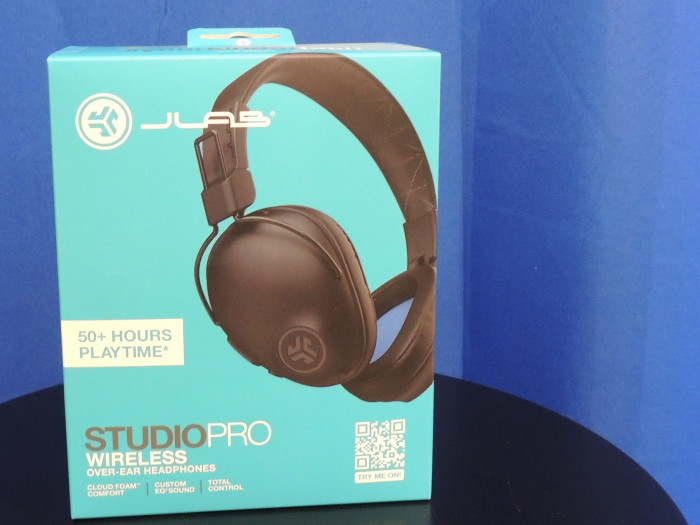 A pair of JLAB Studio PRO, over the ear headphones. These Bluetooth to your phone and have 50+ hours of playtime.