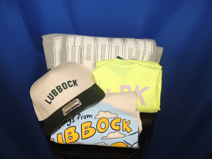 2 Lg Lubbock themed shirts, 1 Lg Lubbock Sweatshirt and a Lubbock hat.
