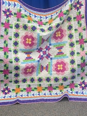 Large colorful handmade quilt