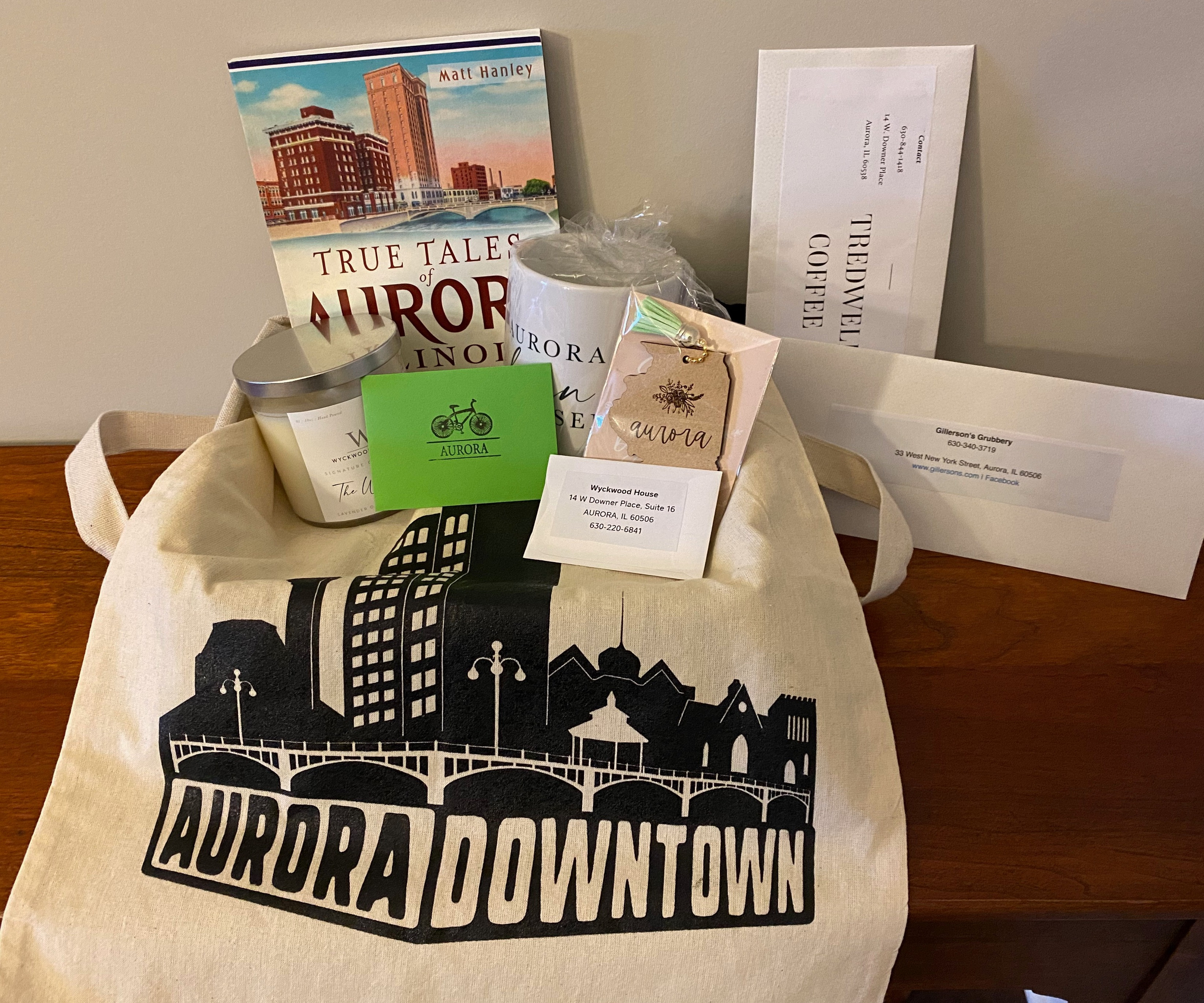 Shop downtown Aurora...Wyckwood House ($50), All Spoked Up ($50), Gillerson's Grubbery ($50), Tredwell Coffee ($20) and Endiro Coffee ($20), a 3'x5' outdoor American flag, and an assortment of City of Aurora memorabilia from Wyckwood House.