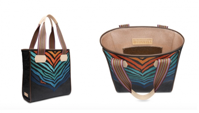 Noah embroidery on black Diamond texture exterior
Black Diamond textured side and back panels
Emery champagne glitter interior
Interior slide pocket and zipper pocket
Comfortable woven straps
Trimmed in natural, untreated leather
13 ½” (W) x 13 ½” (H) x 5 ½” (D), 9 ¾" handle drop
Made in Mexico