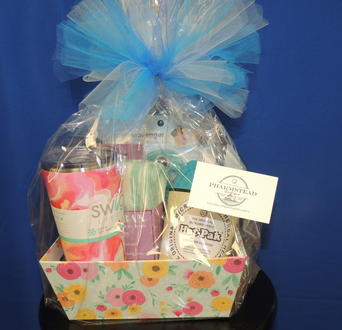 Includes a Swig cup, scented hot pack, a palm massager and more.