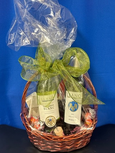 Gift basket with a bottle Merlot and Sauvignon Blanc and goodies