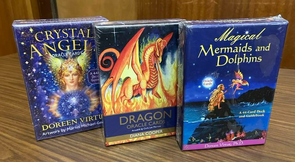 Three oracle decks: Crystal Angel, Dragon and Magical Mermaids & Dolphins