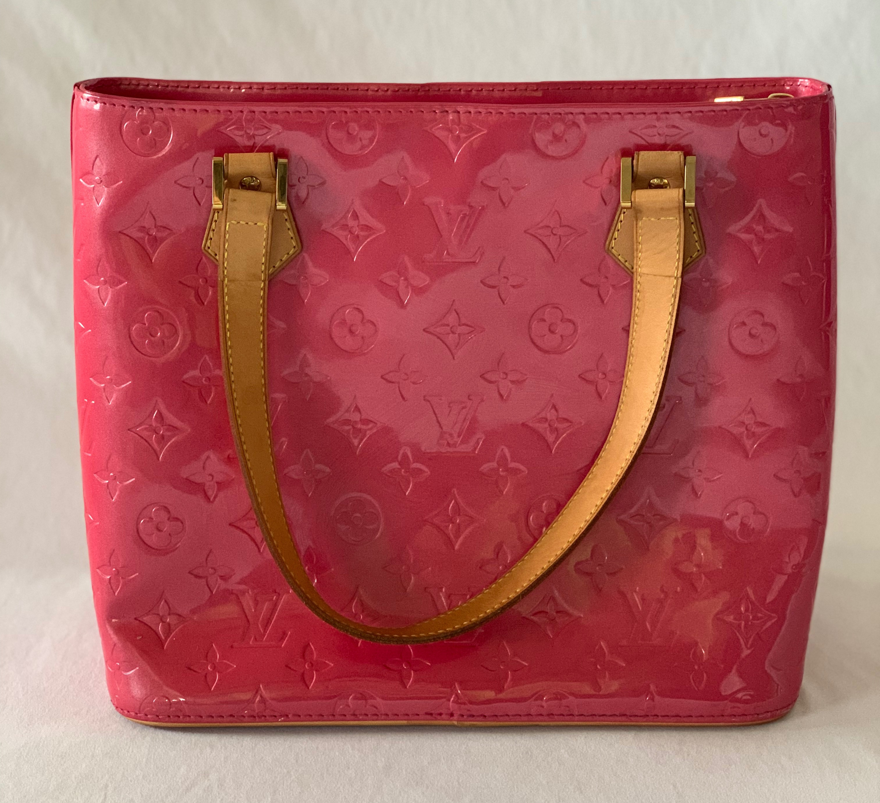 Pink sherbert patent leather monogram vernis Houston handbag. Tan accents and pink leather interior. Minor black scuffs on bottom and back panel.